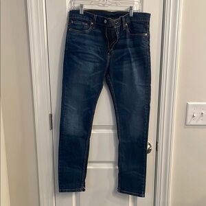 Men's Dark Blue Jeans
Size: 32x30
Distressed tearing at leg cuff inseam